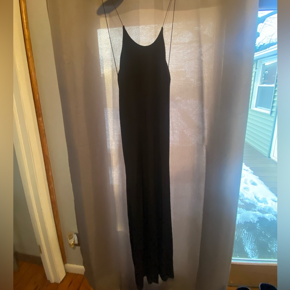 Elegant long black dress with open back